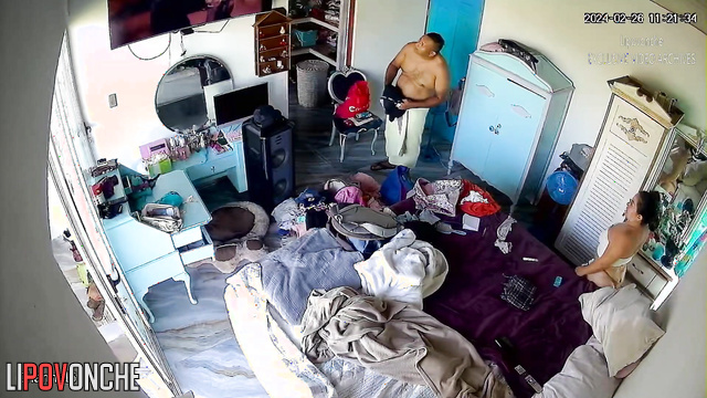 Two fat people dressing to work (naked video from bedroom)