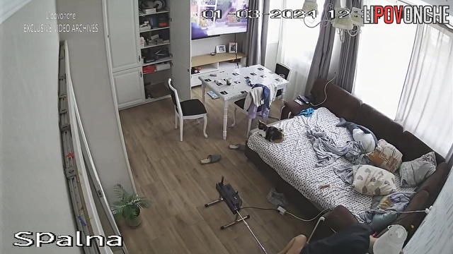 Bald man and his girlfriend watching lesbian porn
