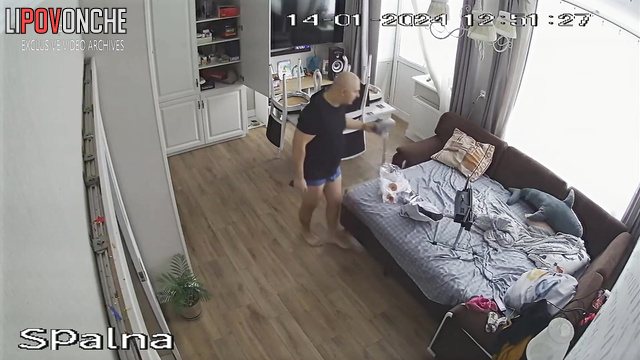 Bedroom video - bald guy walking around the apartment with an erect penis