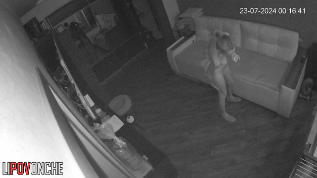 Skinny, beautiful, naked woman rubs herself with cream after a shower