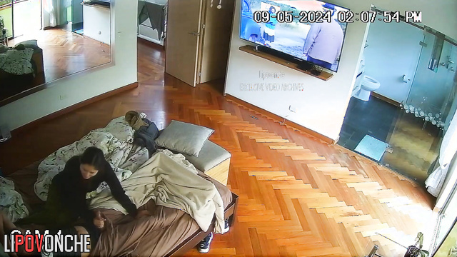 Shy brunette making handjob to her stepfather during tv watching