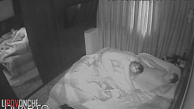 Couple kissing during passionate sex (night tape from cam)