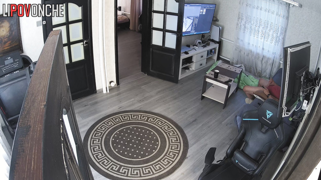 Man jerks off in living room in front of TV to homemade porn