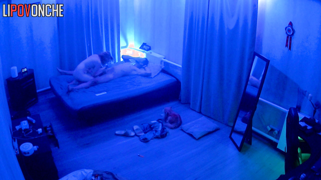 Naked couple having a great time in the fluorescent room