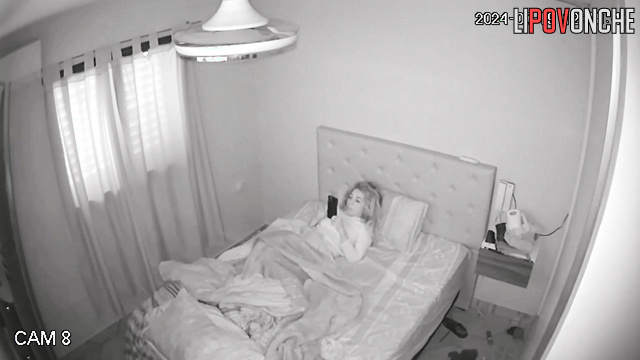 Man fucks tattooed girl on small bed in front of TV