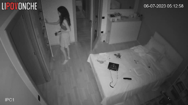 Brunette takes a picture of her butt in the mirror