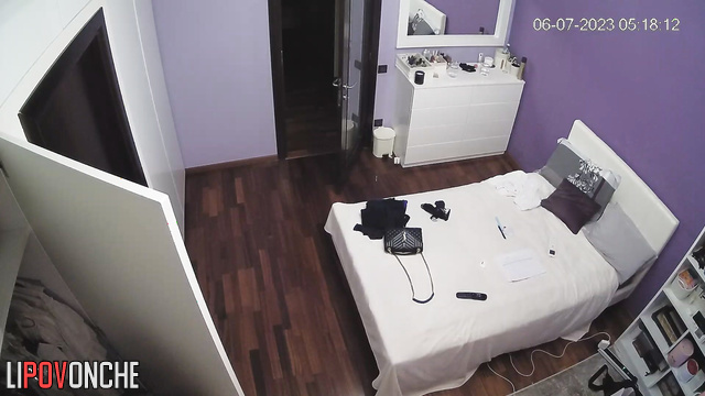 Brunette takes a picture of her butt in the mirror