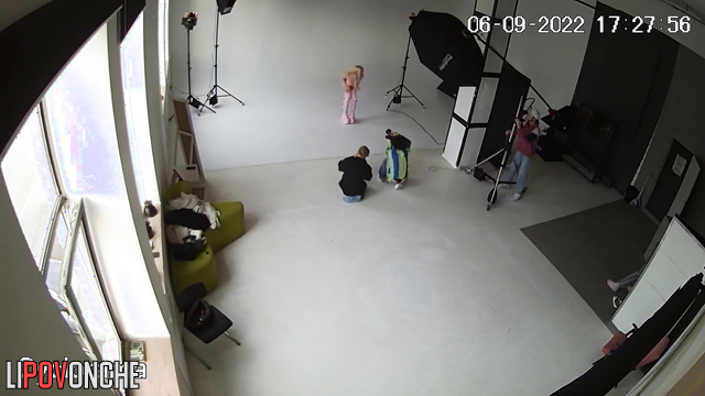 Busty whore taking part in dissolute photo shoot