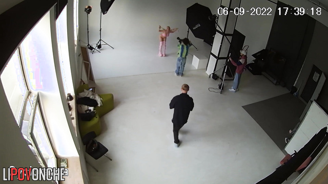 Busty whore taking part in dissolute photo shoot