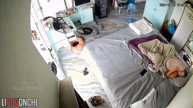 Babe having fun with herself as best she can (hidden cam)