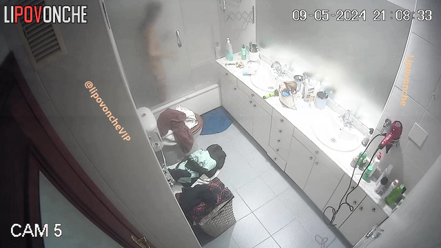 Cute brunette taking shower after dissolute party