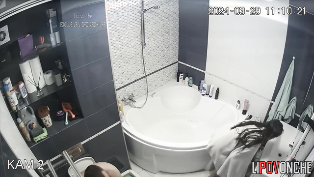 Young couple changing clothes and taking a bath together