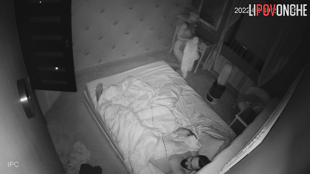 Bearded guy kissing sexy blonde in the bed
