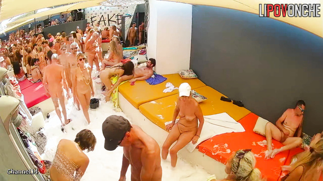 A closed foam party is in full swing with lots of sex