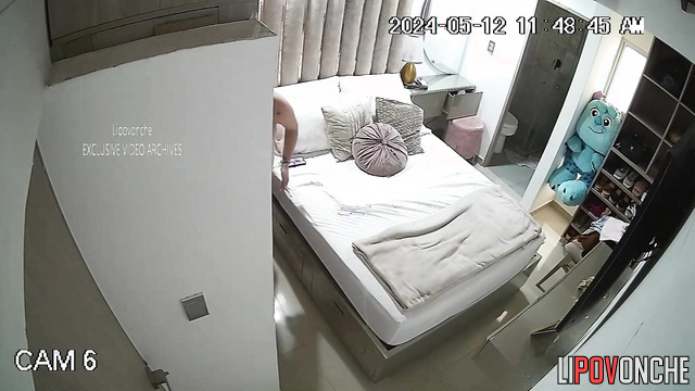 Tattooed brunette with big booty changes clothes in bedroom