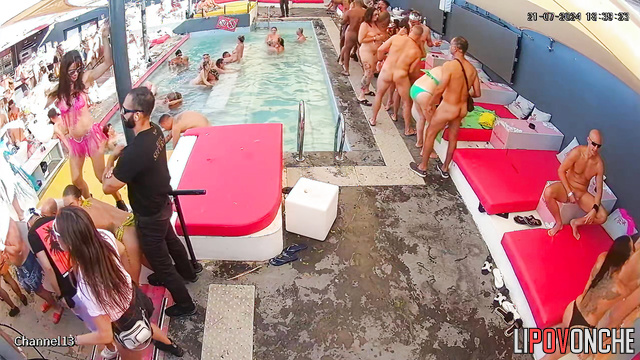 Slutty lady sucking stranger's dick right in the pool