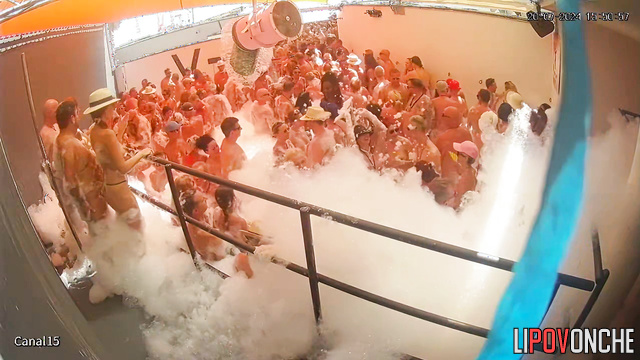 People in foam dancing naked in summer private party