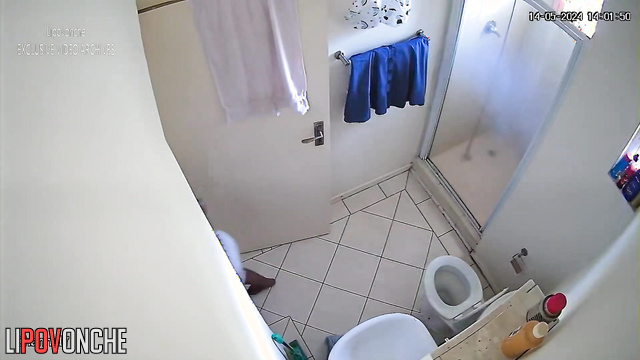 Busty black woman dressing in the bathroom - hot video