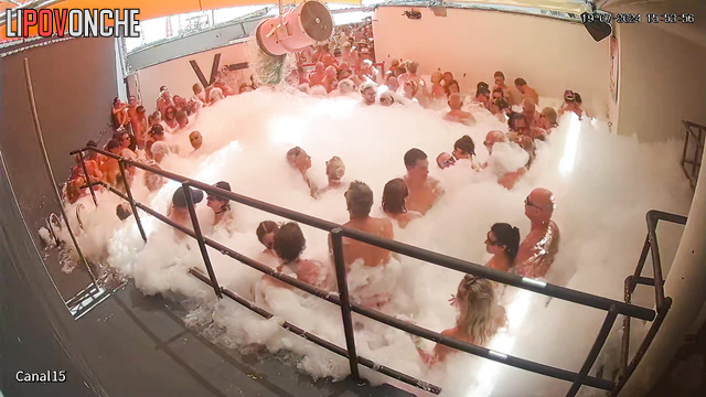 A private foam party where they kiss, fuck and dance