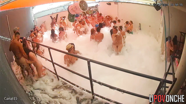 Naked people enjoying oral sex at the foam party (pool)