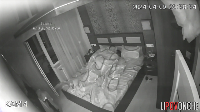 Brunette with long hair fucked a man in the bedroom on the bed