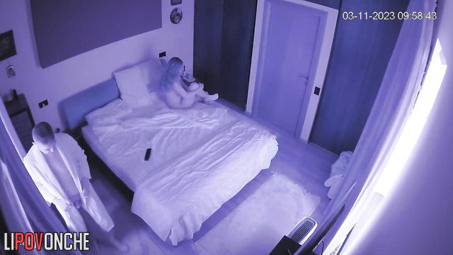 Mature couple fucking on bed in bedroom under blanket