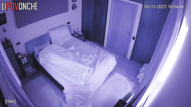 Mature couple fucking on bed in bedroom under blanket