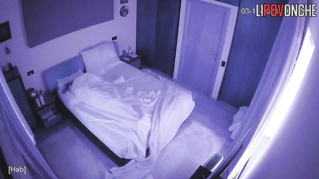 Mature couple fucking on bed in bedroom under blanket