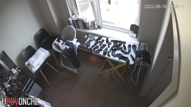 Busty woman is going to stroke his socks, hidden camera