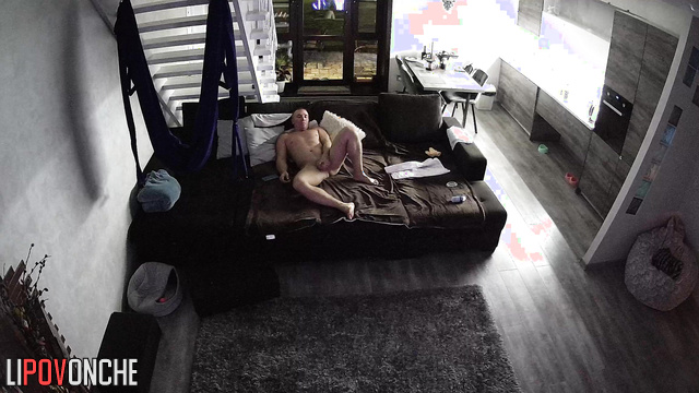 Naked man relaxing after awesome fuck in the living room
