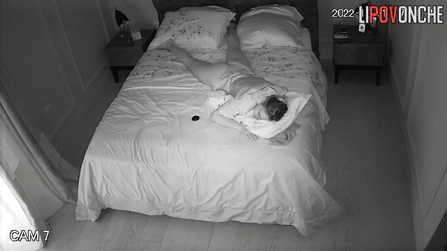 Couple having a nice conversation on the bed in the bedroom