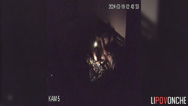 Couple watching TV and fucking on bed in the dark.