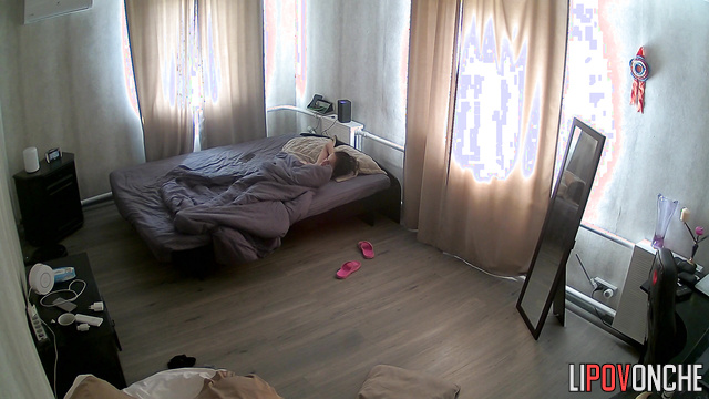 Naked girl dreaming of a good fuck lying on the bed