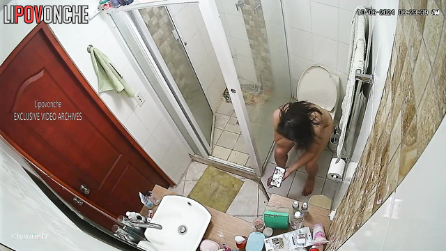 Naked brunette with big tits and ass visited the toilet