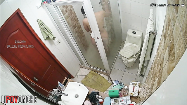 Pretty busty girl washing in the bathroom after sex