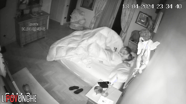 Hot homemade sex under sheets - couple having fun at night