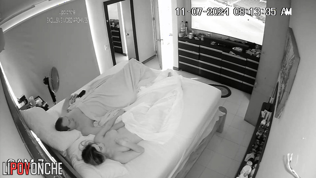 Sex instead of watching a boring program (couple is in the bed)