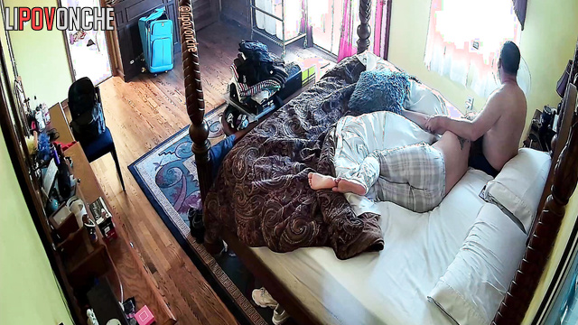 Naked couple having fun on the bed (their morning routine)