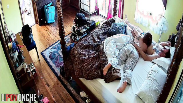 Naked couple having fun on the bed (their morning routine)