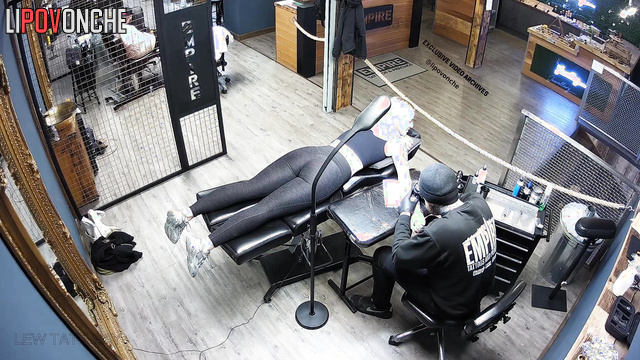 Oops, it is a hidden cam inside tattoo salon, enjoy