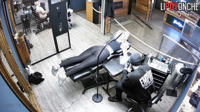 Oops, it is a hidden cam inside tattoo salon, enjoy