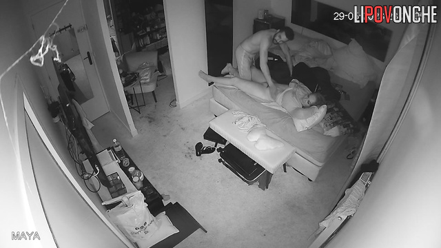 Handsome bearded guy making her an intimate massage