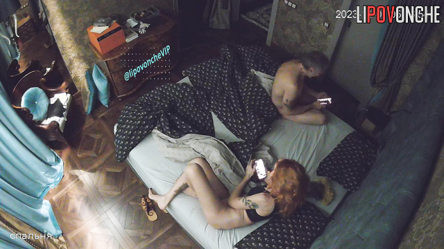 Redhead lady watching her asshole in the mirror