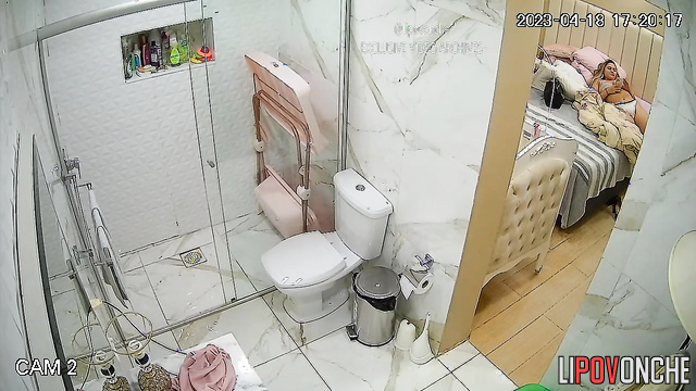 Chubby blonde peeing after hot masturbation (bathroom video)