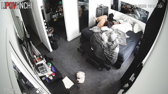 Busty woman rolling around in bed - bedroom video