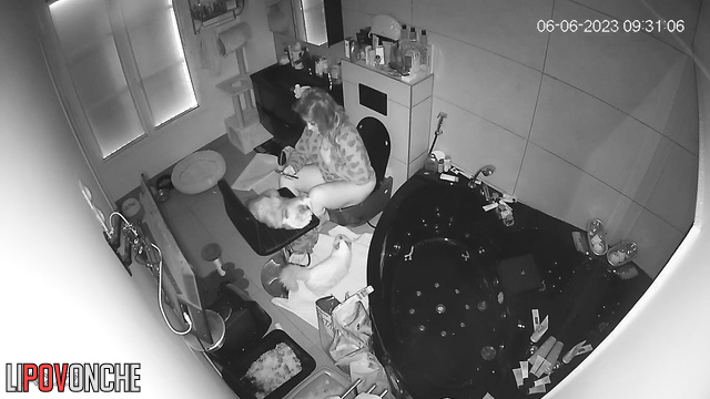 Chubby lady peeing and playing with her funny cats