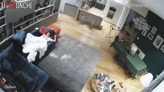 Lonely brunette relaxing after unlacky date (living room)