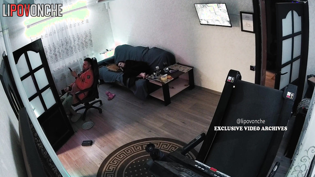Guy jerking off on a lesbian porn while his wife is sleeping