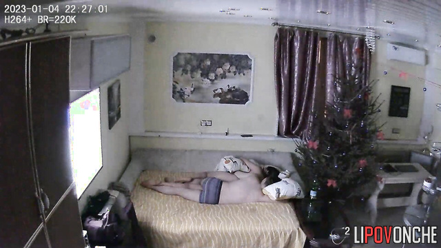 Couple sleeping together after New Year's Eve