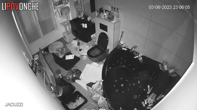 Blonde sitting on the toilet and chatting with brother